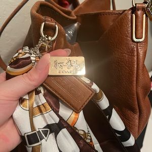 Coach Phoebe with two tags and a twilly